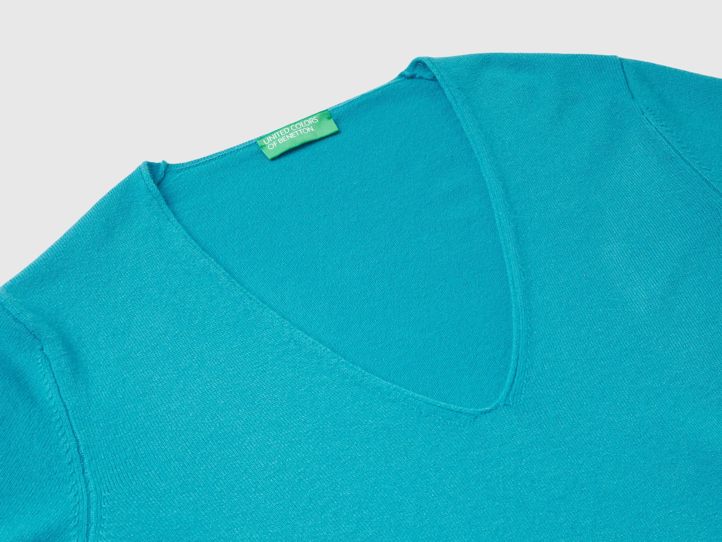 Turquoise V-neck sweater in pure Merino wool - Turquoise | Benetton