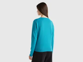 Turquoise V-neck sweater in pure Merino wool - Turquoise | Benetton