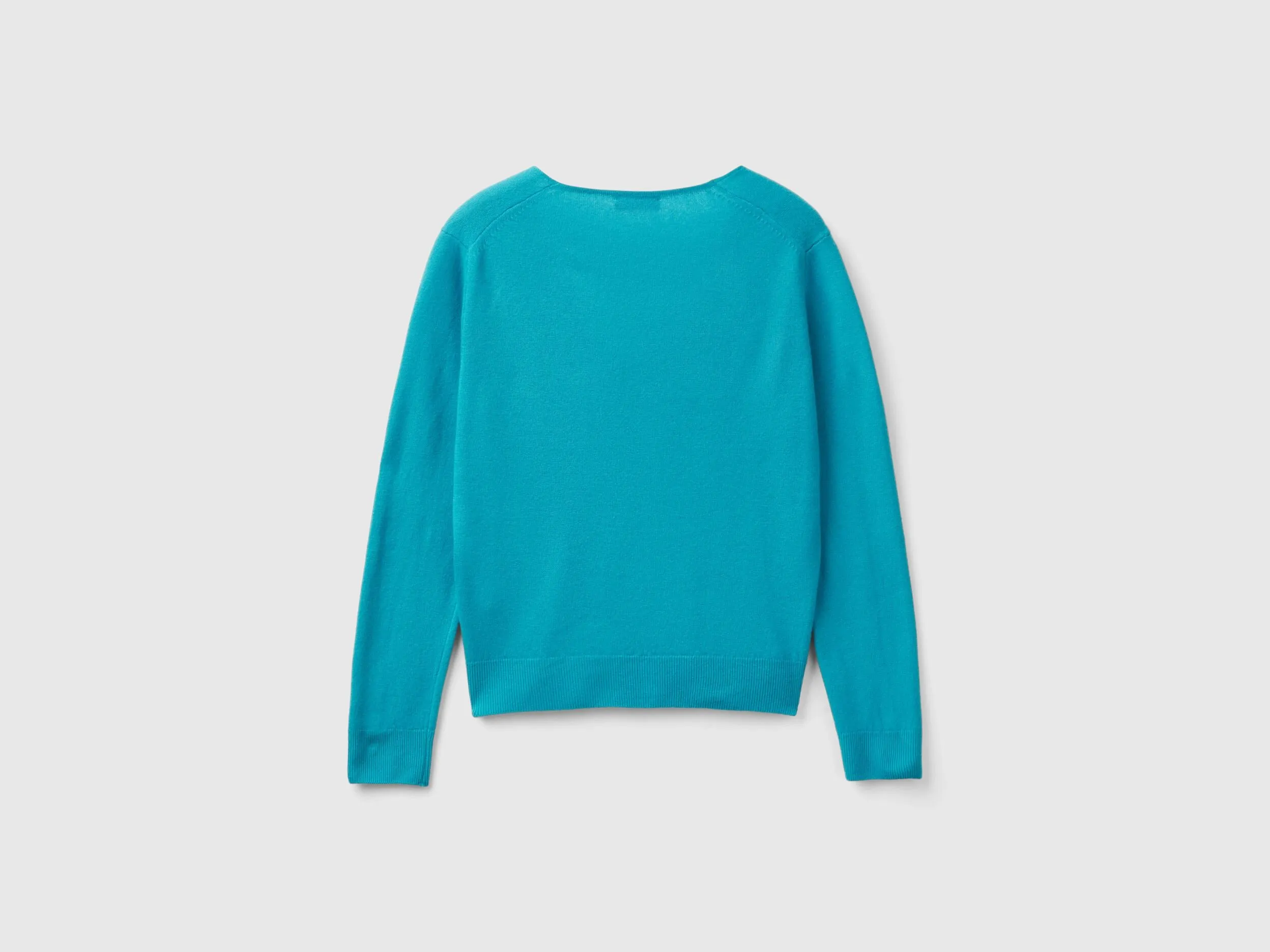 Turquoise V-neck sweater in pure Merino wool - Turquoise | Benetton